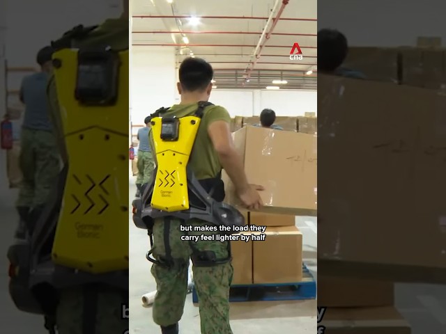 SAF soldiers use exoskeleton suits to prepare NDP packs