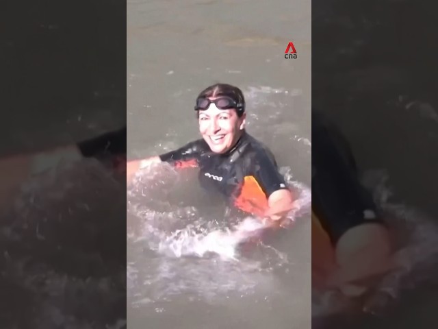 Paris Mayor Anne Hidalgo swims in Seine to prove safety for Olympic