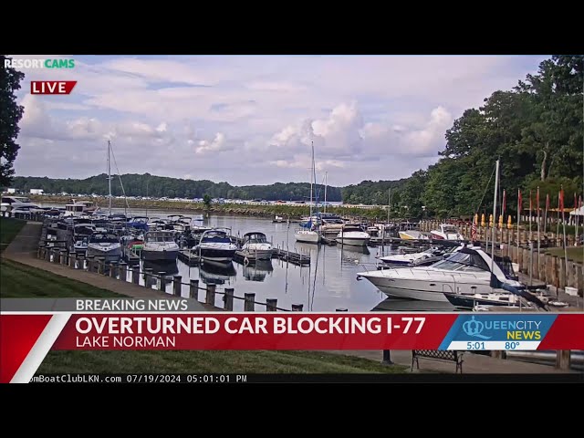 ⁣Overturned car blocking I-77 over Lake Norman