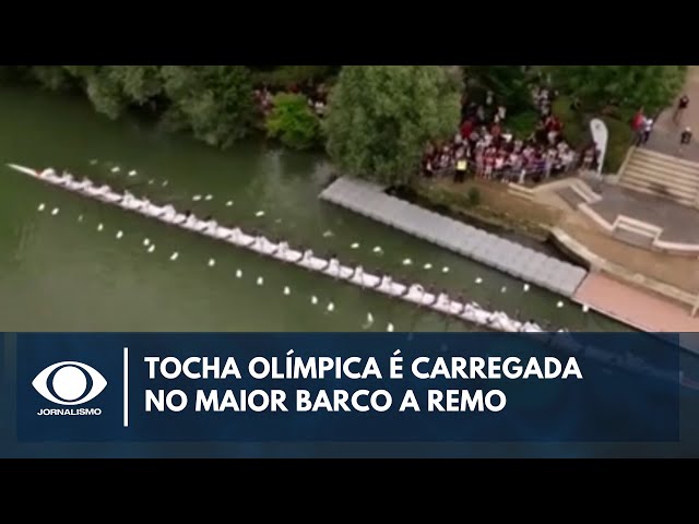 Tocha olímpica é carregada no maior barco a remo do mundo | Band Jornalismo