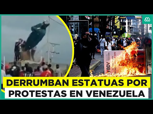 ⁣Derrumban estatua de Hugo Chávez: Duros enfrentamientos y protestas en Venezuela