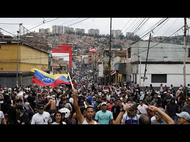 ⁣Venezuelans clash with police as disputed election is handed to President Maduro