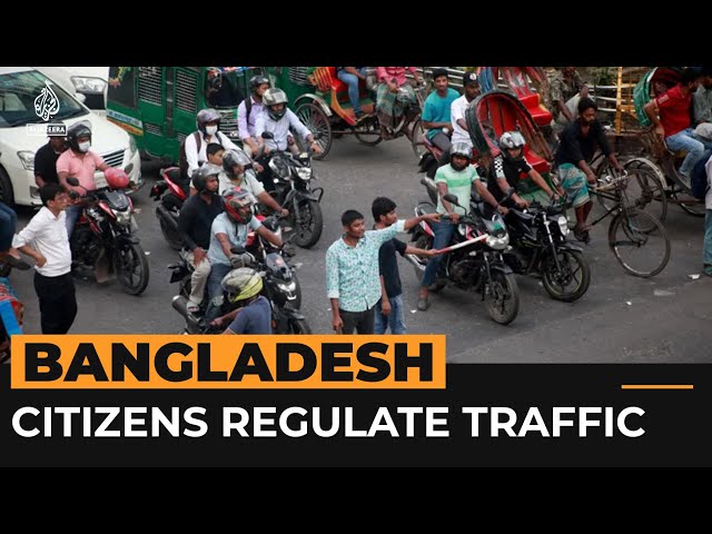 ⁣Young Bangladesh citizens direct traffic in Dhaka | AJ #Shorts