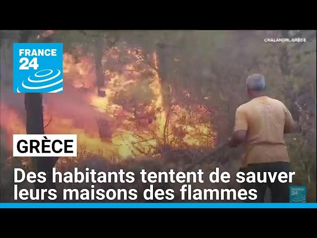 Grèce : des habitants tentent de sauver leurs maisons des flammes • FRANCE 24