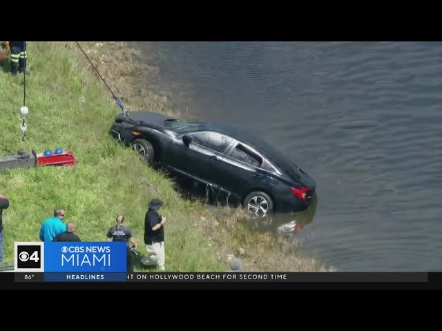 ⁣Body found in car pulled from Sunrise canal