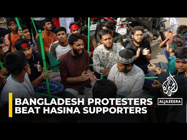 Bangladesh protesters, vowing to ‘guard revolution’, beat Hasina supporters