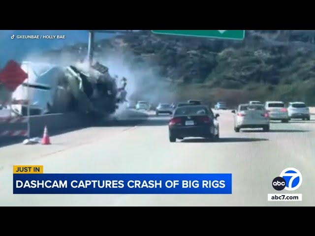 ⁣Video shows out-of-control big rig slam into divider, spill raisins onto 2 Freeway