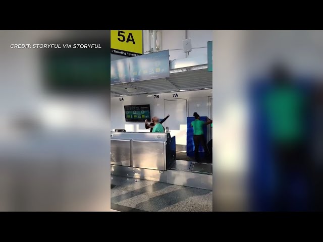 ⁣WATCH: Enraged passenger throws computer monitor at airline staff