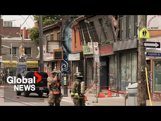 ⁣Toronto building evacuated after roof seen teetering dangerously above street