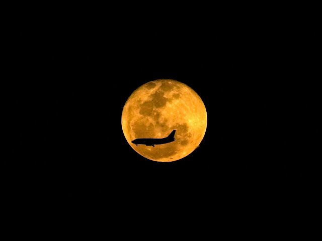 Supermoon lights up the night sky in Paris