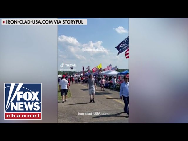 ⁣Chilling new video shows Trump shooter walking around rally