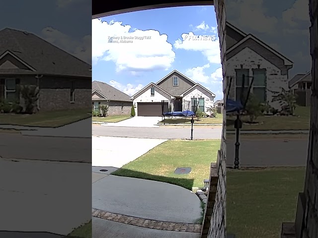 ⁣Caught on doorbell camera: wind gusts hurl trampoline onto roof of house