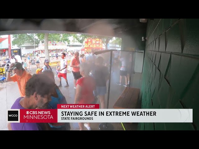 ⁣Minnesotans try to keep cool at the fair despite excessive heat