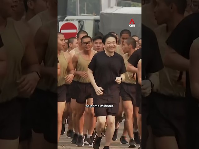 ⁣PM Lawrence Wong jogs with recruits at Singapore's Basic Military Training Centre