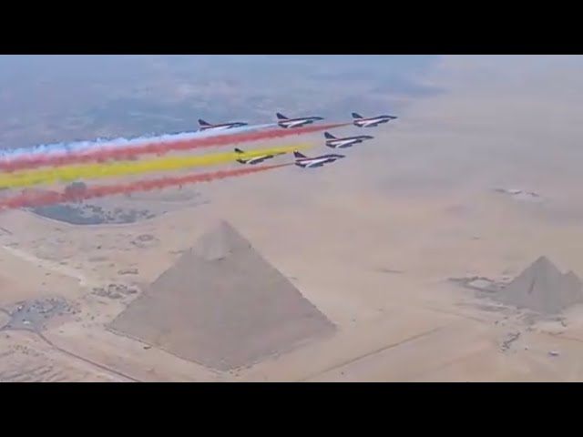 ⁣PLA Air Force performs formation flyover at the pyramids