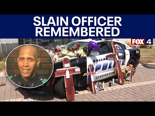 ⁣Dallas police shooting: Memorial grows for officer killed in the line of duty