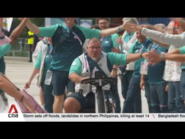 ⁣Volunteers overcome own disabilities to help out at Paralympic Games