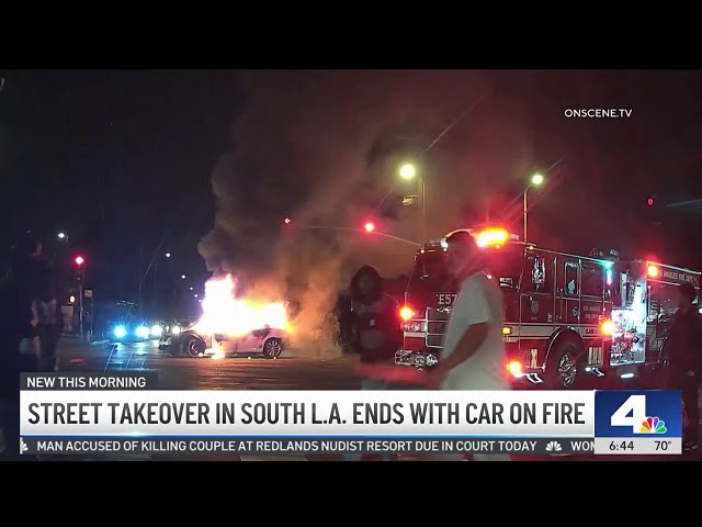 ⁣Street takeover in South LA ends with car on fire