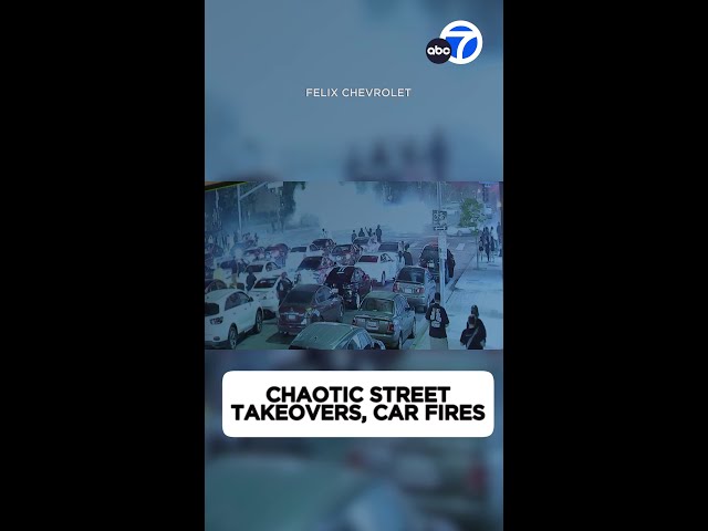 ⁣Cars on fire, dealership damaged during street takeovers across Los Angeles