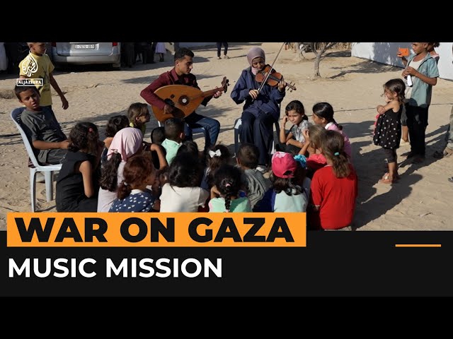 ⁣Gaza music students use talent to inspire children displaced by war