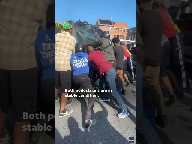 ⁣Good Samaritans band together to save man trapped in a car #Shorts