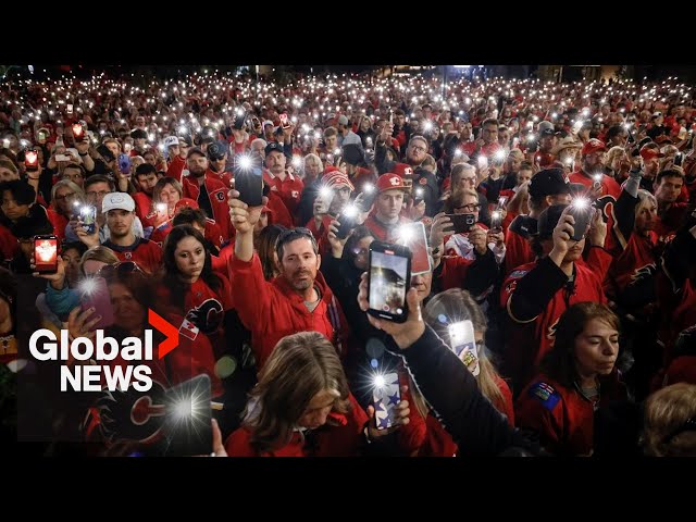 ⁣Gaudreau brothers remembered by Calgary Flames and their fans at candlelight vigil