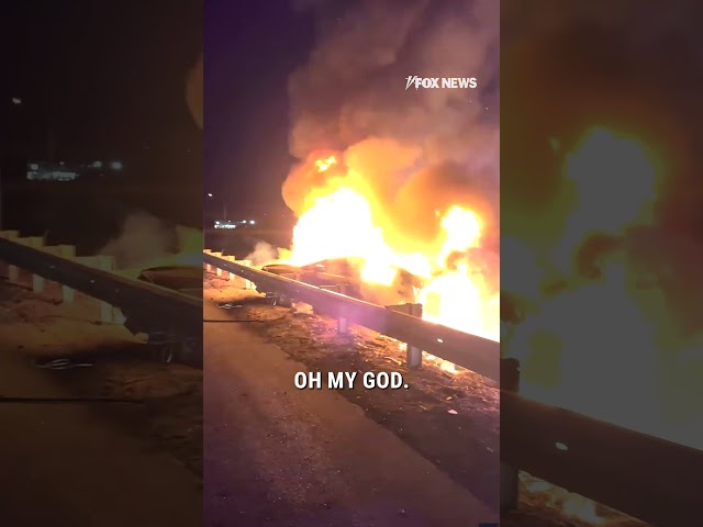 ⁣Good Samaritans save man trapped in burning car moments before it was completely engulfed in flames