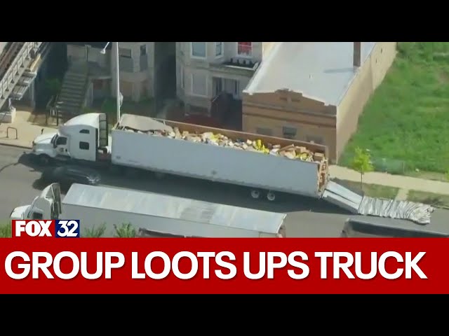 ⁣Group loots UPS truck after it strikes viaduct in Chicago