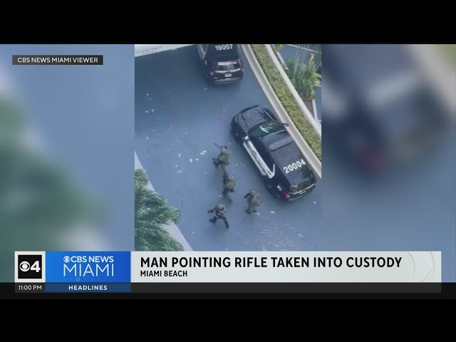 ⁣Man in custody after pointing rifle to people in Miami Beach, police said