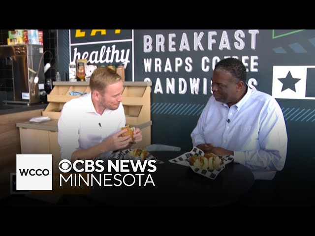 Reg and Adam share a sandwich to celebrate a huge milestone