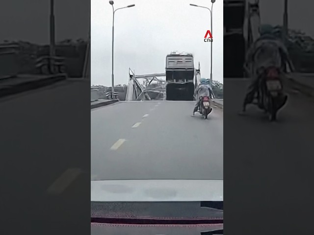 ⁣Dashcam footage captures moment bridge collapses in Vietnam after Typhoon Yagi