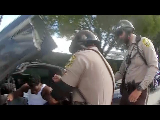 ⁣Bodycam shows Miami officer drag Dolphins star Tyreek Hill out of car