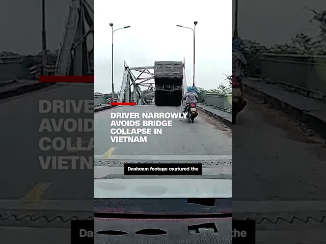 ⁣Driver narrowly avoids bridge collapse in Vietnam