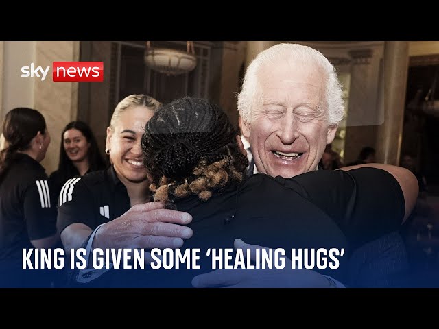 ⁣'A hug? Why not!': King Charles swarmed by New Zealand women's rugby team