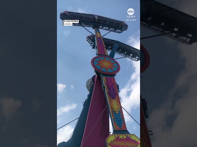 ⁣Carnival worker makes amazing save after rider drops phone