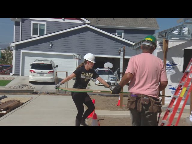 ⁣Colorado Day of Service volunteers power veterans housing project