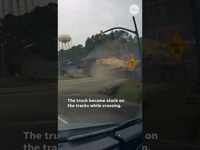 ⁣Terrifying moment train slams into truck hauling tank #Shorts