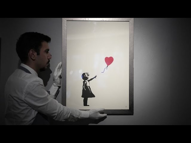 ⁣Two men charged with stealing Banksy's 'Girl with Balloon' from London gallery