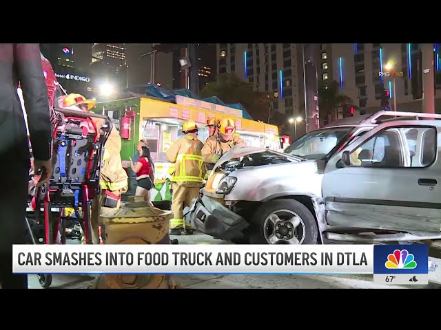 ⁣Car smashes into food truck and customers in downtown LA