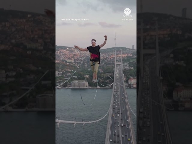 ⁣Daredevil walks slackline from Asia to Europe - ABC News