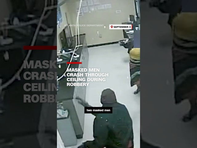 ⁣Masked men crash through ceiling during robbery