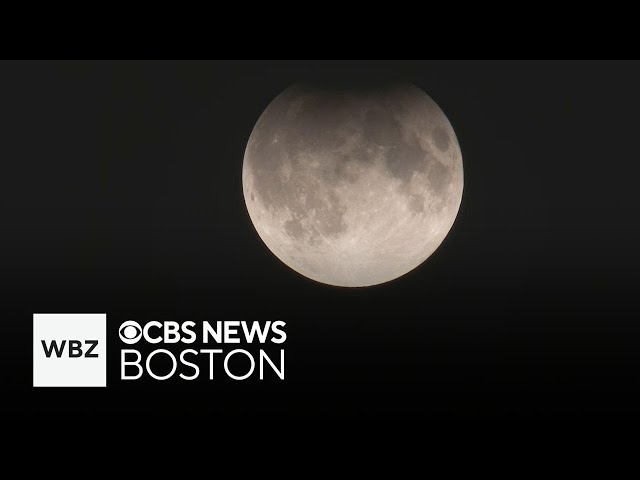 ⁣Partial lunar eclipse seen over Massachusetts