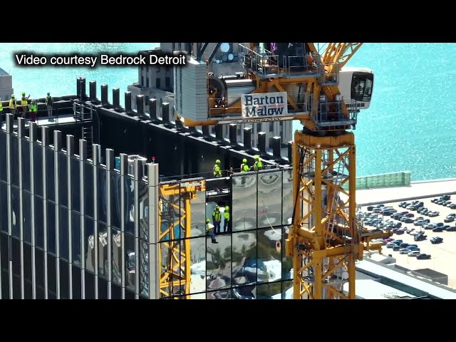 ⁣Glass panels installed at top of Hudson's Detroit Tower as exterior nears completion