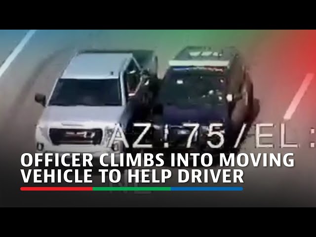 ⁣Police officer climbs from one moving vehicle into another to help driver | ABS-CBN News