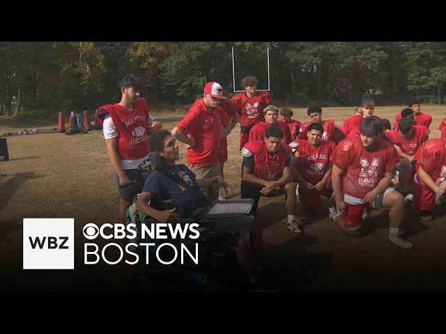 ⁣High school football coach with cerebral palsy inspires his team, hopes to coach