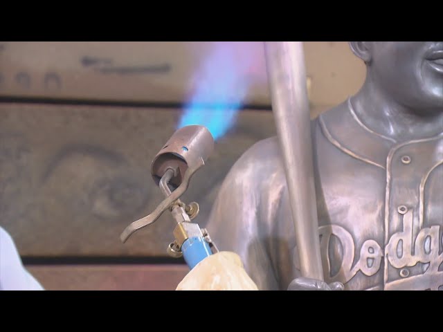 Loveland artist steps up to plate to fix Jackie Robinson statue that was damaged