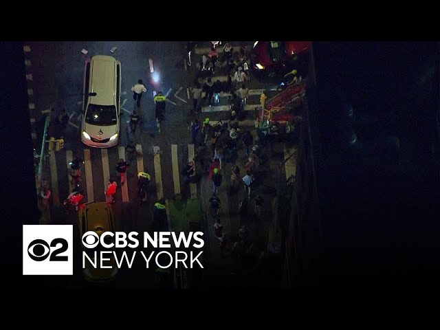 ⁣Pro-Palestinian, anti-NYPD protesters march through NYC