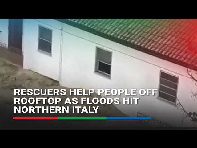 ⁣Rescuers help people off rooftop as floods hit northern Italy | ABS-CBN News