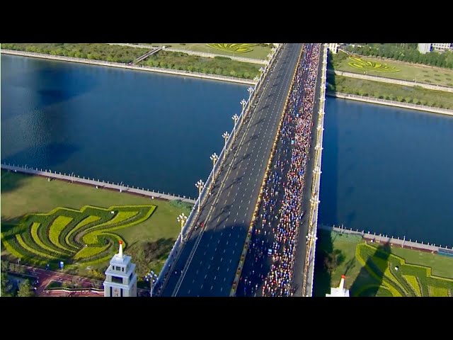 ⁣40,000 runners compete in 2024 Taiyuan Marathon in N China's Shanxi