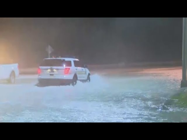 ⁣Hurricane Helene storm surge washing over coastal roads in Key West